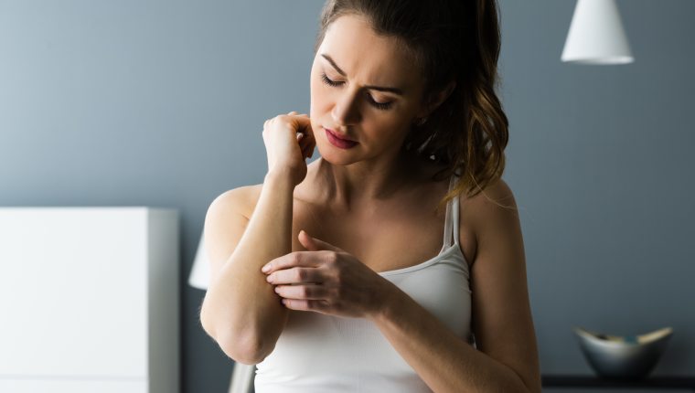 Woman prepares for chickenpox test.